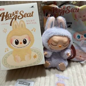 ZIZI- Pop Mart Labubu Have A Seat - New.Box opened to verify. Cute Purple!